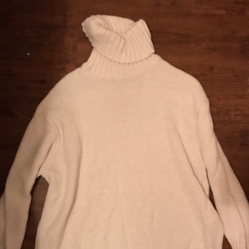 Oversized white turtleneck sweater